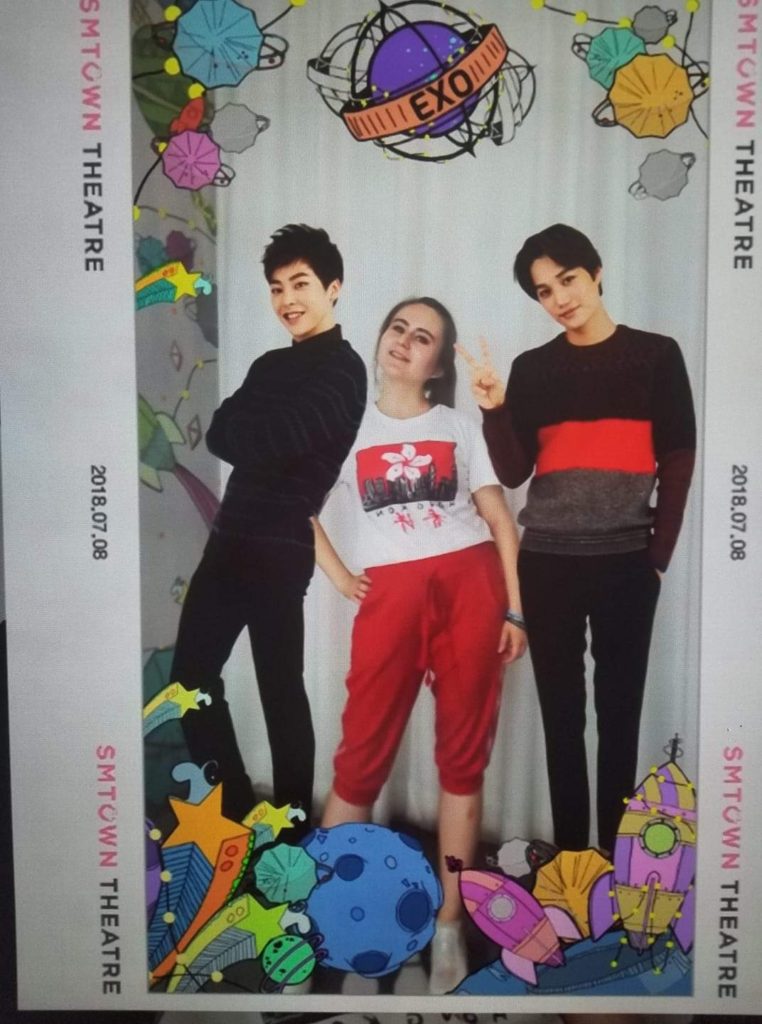 Taking a photo with Exo members at the SM Coexartium in Seoul.