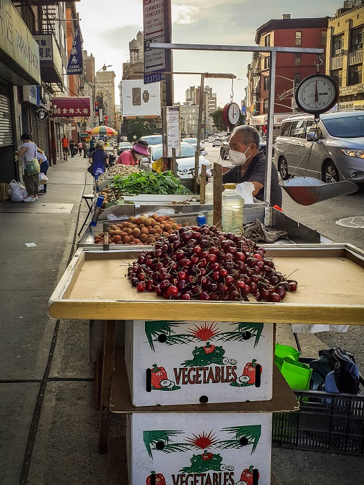 Street vendors are a common sight in Chinatown Manhattan and reflect the more traditional side of Chinese culture in New York.