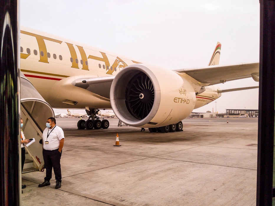 Disembarking an Etihad Airways plane after landing in Abu Dhabi during the pandemic.