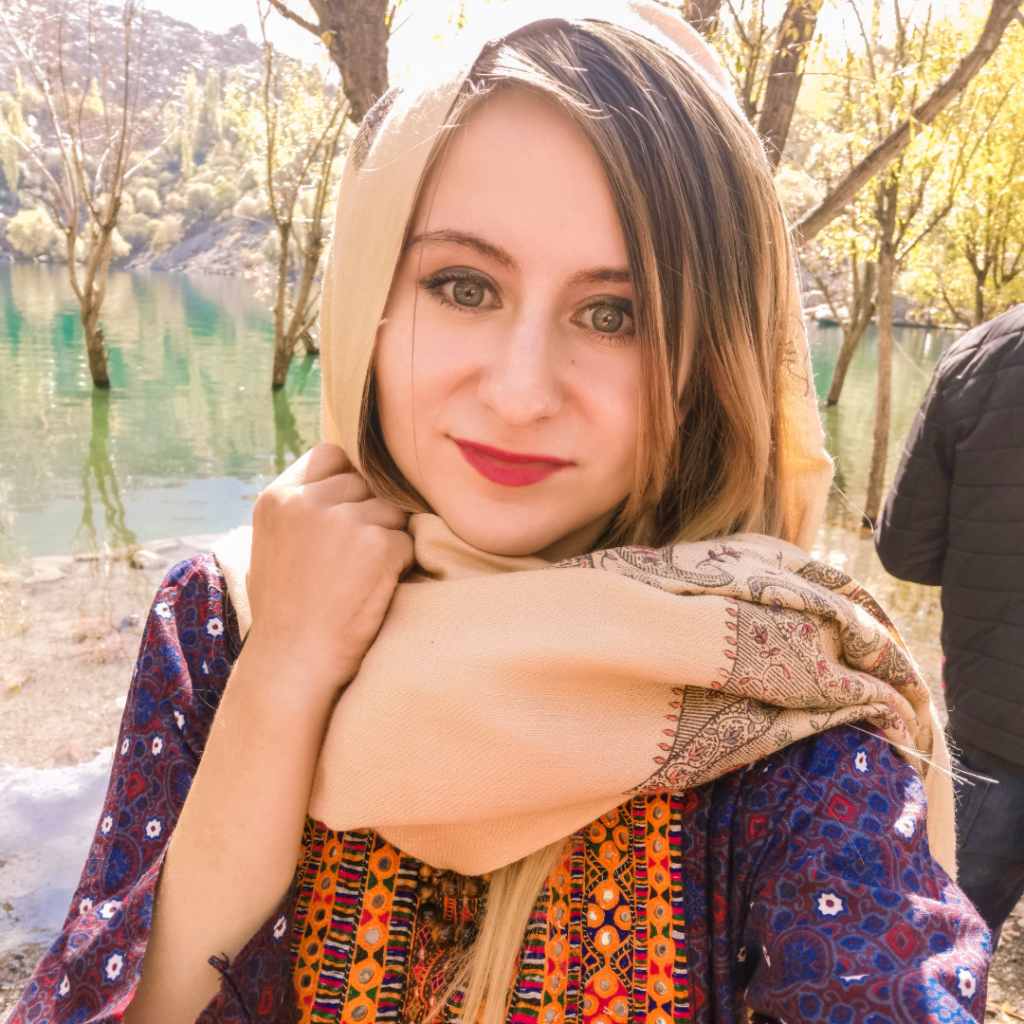 A Complete Travel Guide To Skardu, Pakistan 9 Foreign girl wearing traditional Pakistani clothing in front of Upper Kachura Lake near Skardu, Pakistan.