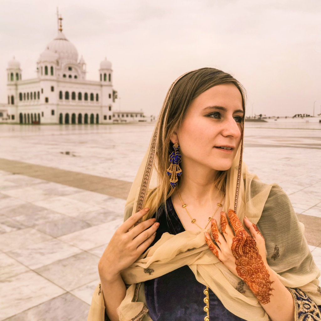 Foreign girl in traditional dress at Kartarpur Gurdwara, Pakistan