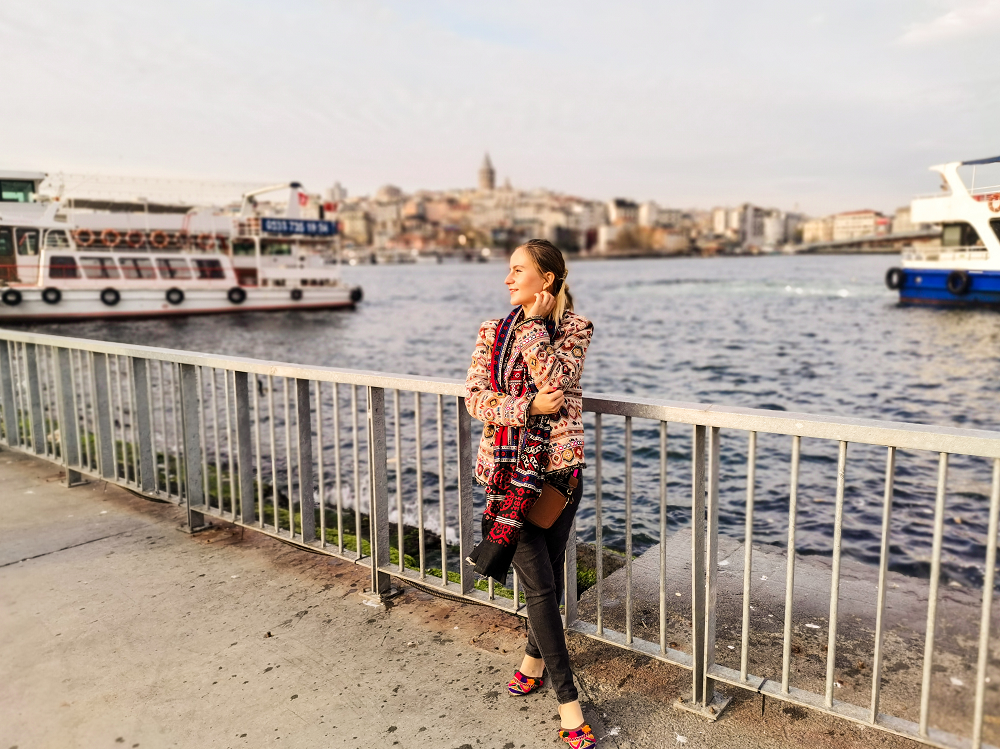 Hello World, Welcome To My Travel Blog! 4 Girl with ajrak in front of the Golden Horn in Eminonu, Istanbul. In the back is Beyoglu area and Galata Tower.