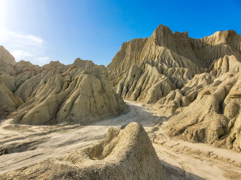 20 Stunning Places To Visit In Chabahar, Iran 19 Sun and blue sky over the rugged Martian Mountains near Chabahar, Iran.