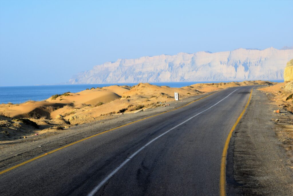 Secret Balochistan - 10 Days Tour To One Of The LEAST VISITED PLACES ON EARTH 14 Makran Coastal Highway, a road passing through golden mountains and deserts and the blue sea, in Hingol National Park, Balochistan, Pakistan